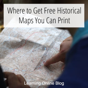 Person pointing to map - Where to Get Free Historical Maps You Can Print