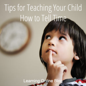 Boy looking at clock - Tips for Teaching Your Child How to Tell Time