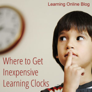 Boy looking at clock - Where to Get Inexpensive Learning Clocks