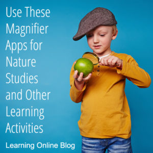 Boy looking through magnifying glass at apple - Use These Magnifier Apps for Nature Studies and Other Learning Activities