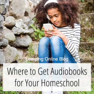 Girl looking at cell phone and listening - Where to Get Audiobooks for Your Homeschool