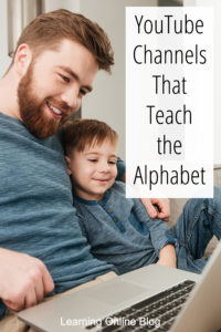 Father and son looking at computer - YouTube Channels That Teach the Alphabet
