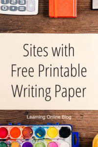 Table with paper, paints, journal, and calculator - Sites with Free Printable Writing Paper