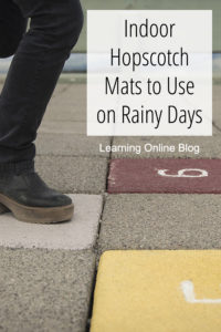 Child jumping on hopscotch rug - Indoor Hopscotch Mats to Use on Rainy Days