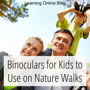 Child on dad's shoulders using binoculars - Binoculars for Kids to Use on Nature Walks