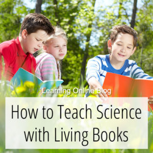 Children reading outside - How to Teach Science with Living Books