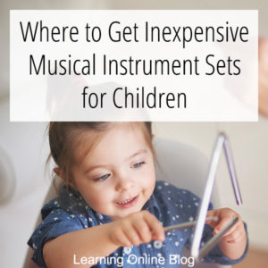 Little girl playing a triangle - Where to Get Inexpensive Musical Instrument Sets for Children