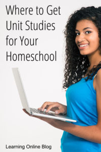 Woman holding laptop - Where to Get Unit Studies for Your Homeschool