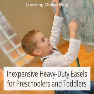 Preschooler drawing on easel - Inexpensive Heavy-Duty Easels for Preschoolers and Toddlers