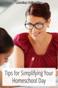 Woman teaching child - Tips for Simplifying Your Homeschool Day