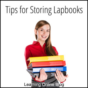 Woman holding binders - Tips for Storing Lapbooks